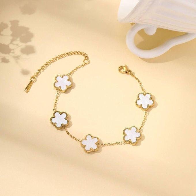 white flower charm bracelet – gold plated stainless steel elegant design white flower charm bracelet – gold plated stainless steel elegant design